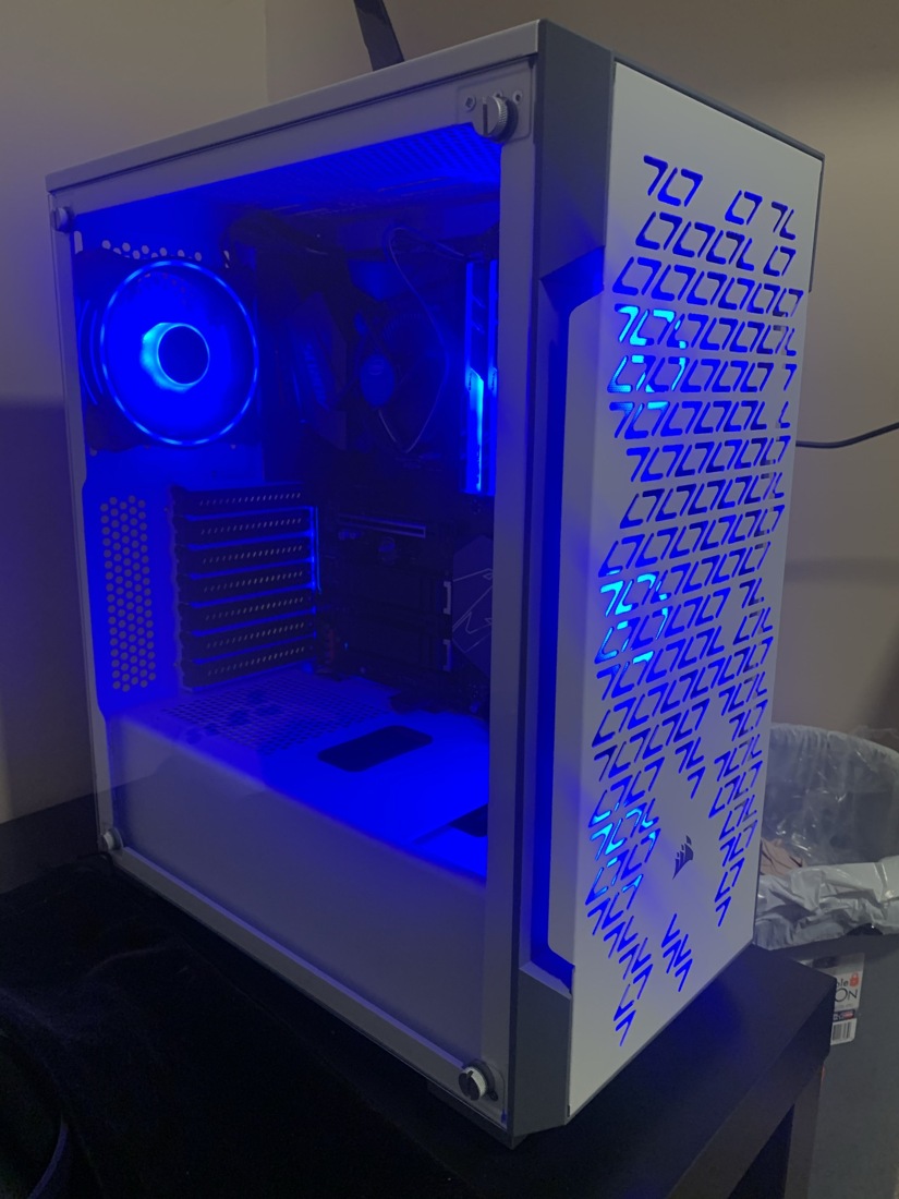 White PC tower with blue illuminated fans